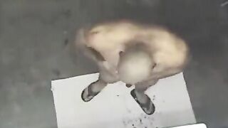 A spy camera in the shower caught a naked man, creating a peep show