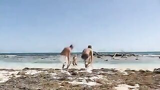 Blonde in group sex on the beach with bikini lovers