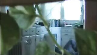 A married couple has fun in their apartment without clothes