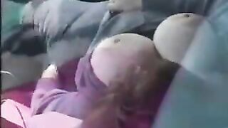 A man masturbates in the car, watching a sexy girl on webcake