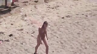 A pair of free-spirited naked lovers enjoy each other at sea