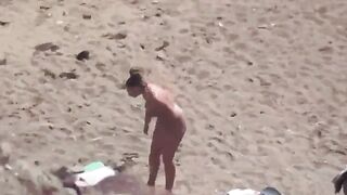 A pair of free-spirited naked lovers enjoy each other at sea