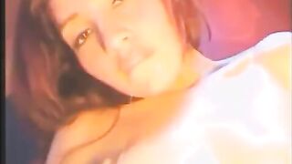 A sexy girl has sex with herself using a vibrator in all her holes