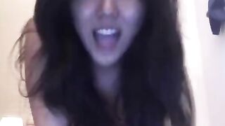 Asian beauty masturbates on camera with intense passion