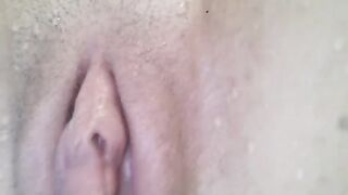 Finger fucking and close-up pussy shot underwater