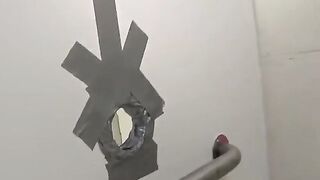 A girl is having fun with friends in the toilet of a night club