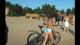 A girl has sex with her boyfriend on the beach without any clothes