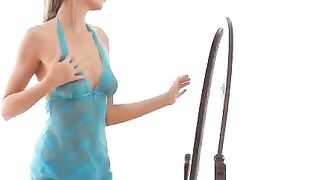 A girl is having erotic fun in front of the mirror, showcasing her moves