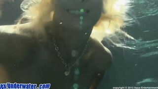A blowjob scene shot right in the swimming pool
