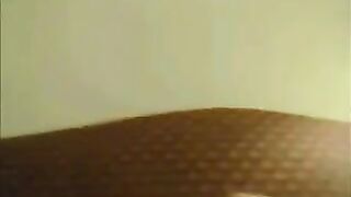 A hot Latina with big tits shakes her tits on webcam