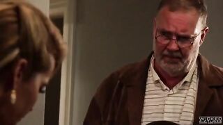 A guy is telling a cowboy story to his busty companion