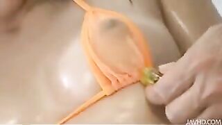 A whale in a bikini is gently prepared for sex with toys