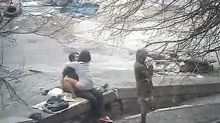 The guy was photographing intimate moments with girls in the public street