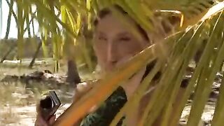 A couple has sex directly on the sandy coast of the sea
