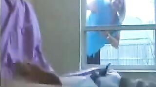 A woman peeps at a man in the ward and masturbates with him