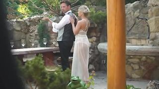 A pair of newlyweds are having their honeymoon on the streets