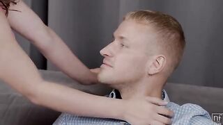 A sexy girl is giving herself to her man on the couch