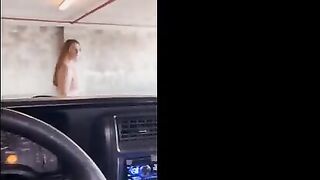 Redhead babe flashes and fucks in the garage