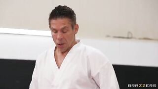 A girl is having sex with her coach in an uncomfortable position
