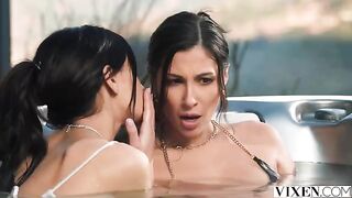 A hot brunette has sex with two guys in this paradise setting