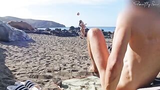 Two girls almost got caught while jerking off on the nude beach