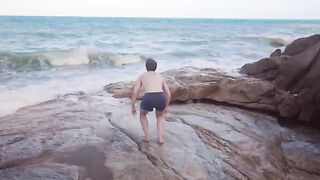 A girl is having fun with someone at a party, getting wild