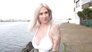 A beautiful blonde tries to seduce a stranger on vacation