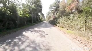 An Amazon rides a guy's dick in clothes outdoors