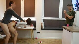 A girl is being fucked by her boyfriend's friends in an intense scene
