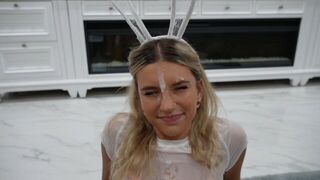A cute girl got a scary face drawing on her face at the Halloween party