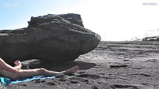 A girl shows her boobs to the guy on the beach