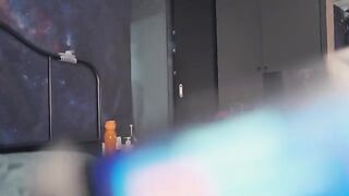 A girl in red underwear is asking a guy to come in