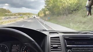 The girl is having fun with the guy in the car, exploring every inch of his impressive size