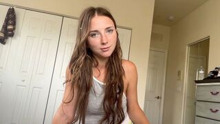 A girl is ready to take off her clothes faster than you can blink