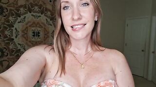 A woman is giving a sensual breast massage with shimmering oil in this steamy JOI scene