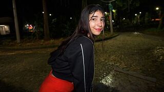 A girl with a great body is screaming with pleasure in the street